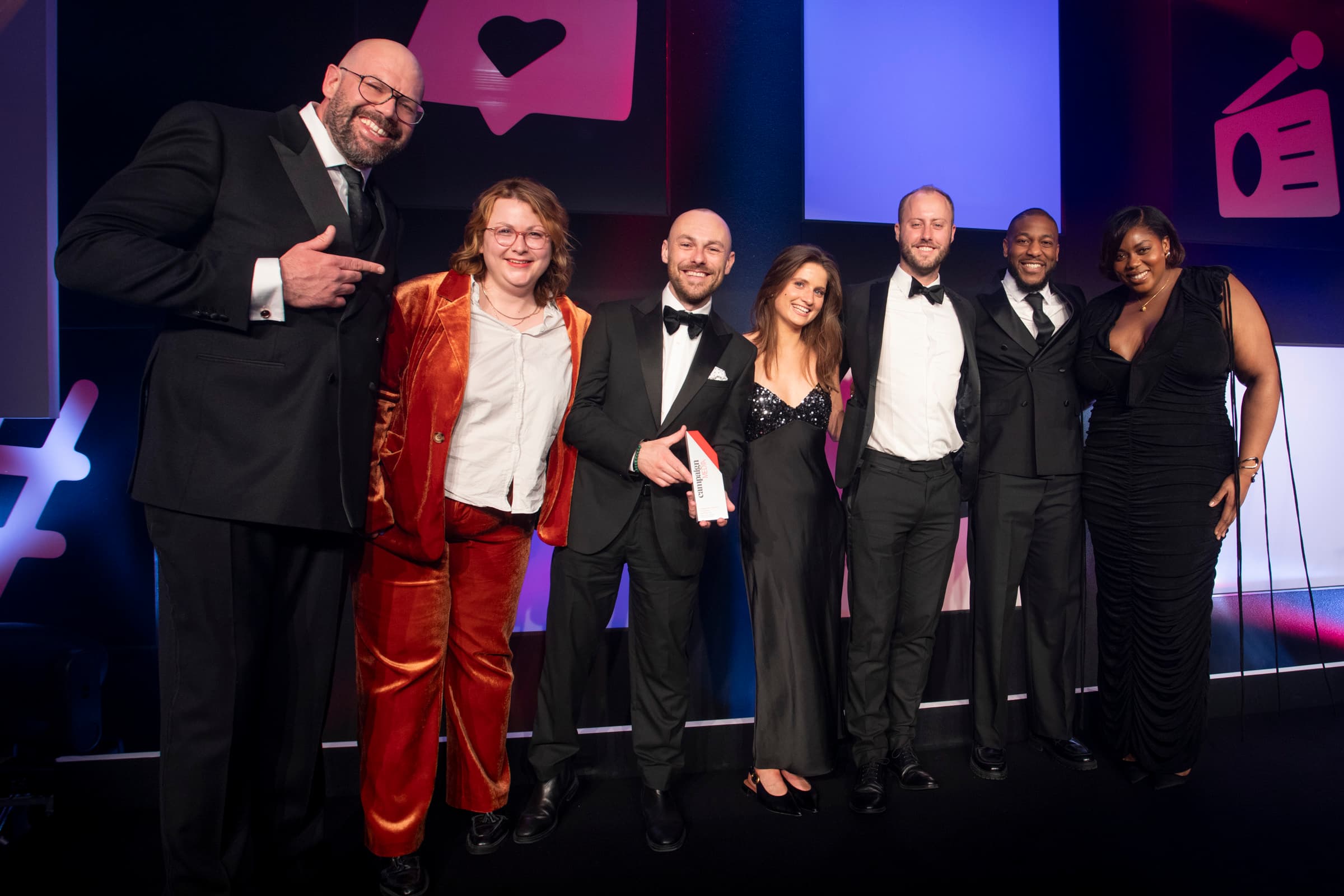 iProspect's UK Carlsberg team collecting their Campaign Media Award