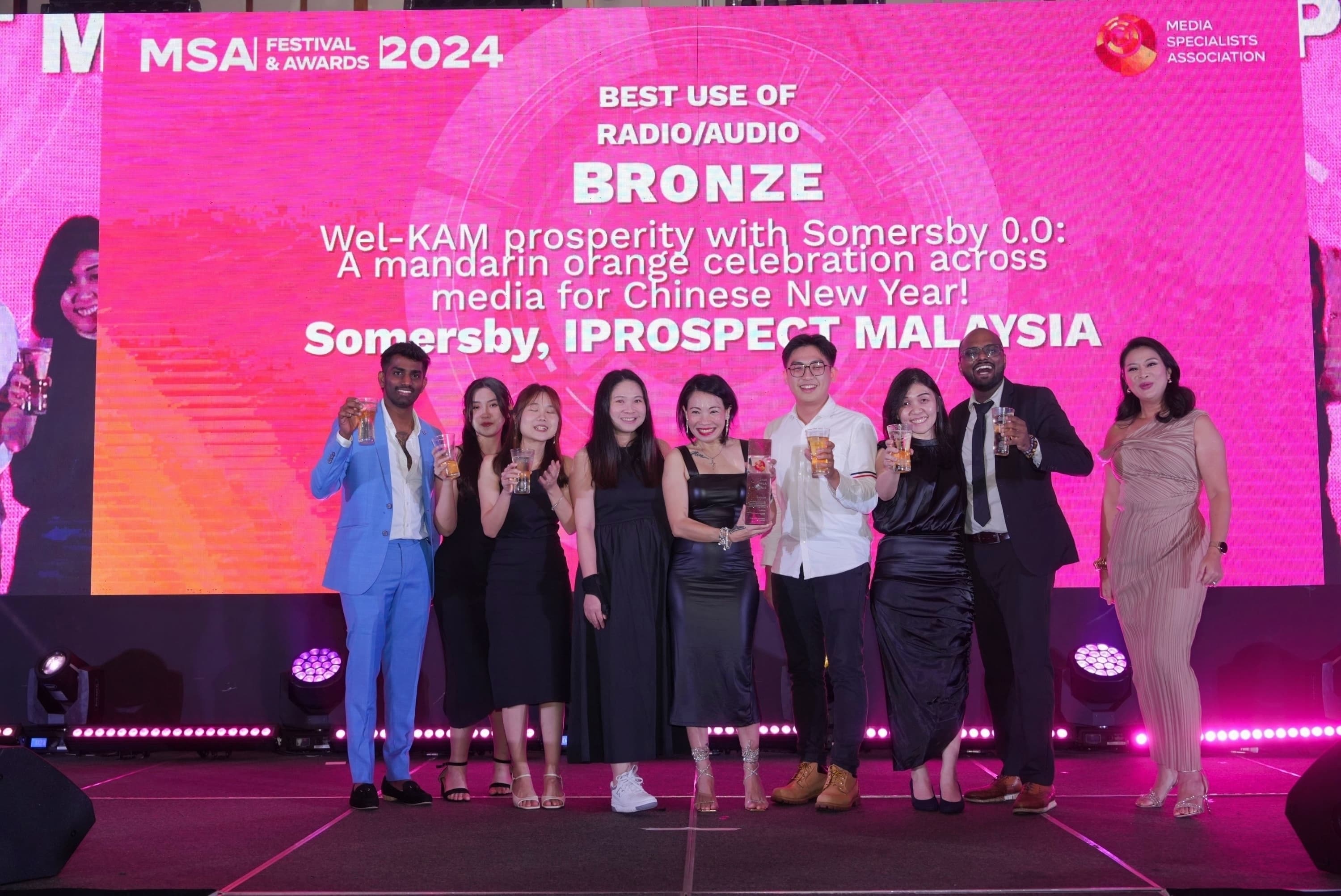 Crew of people receiving the awards