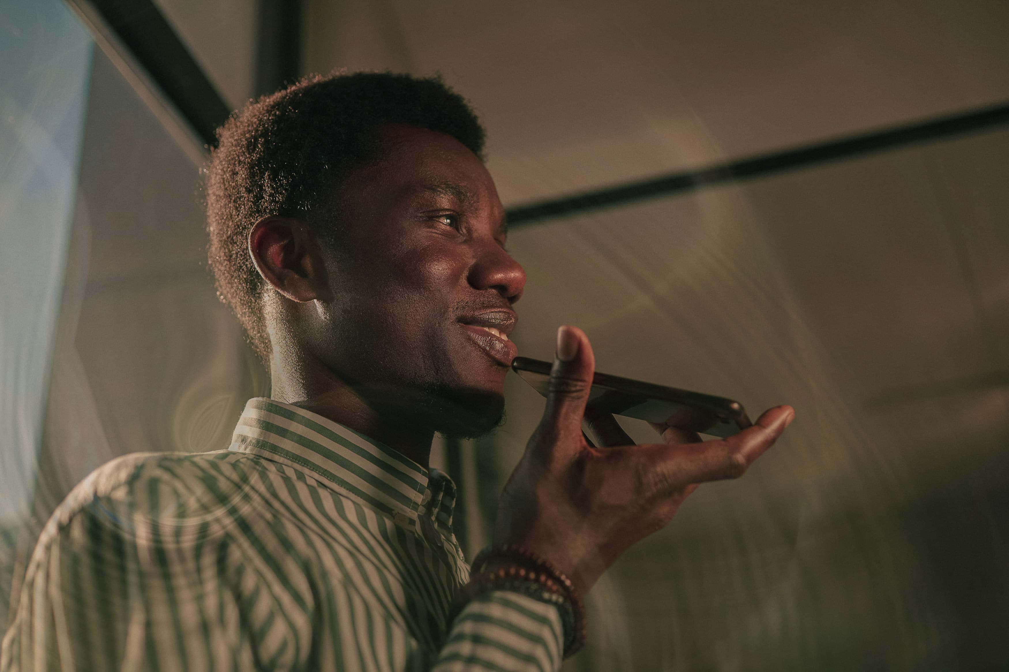 image of man talking into mobile phone