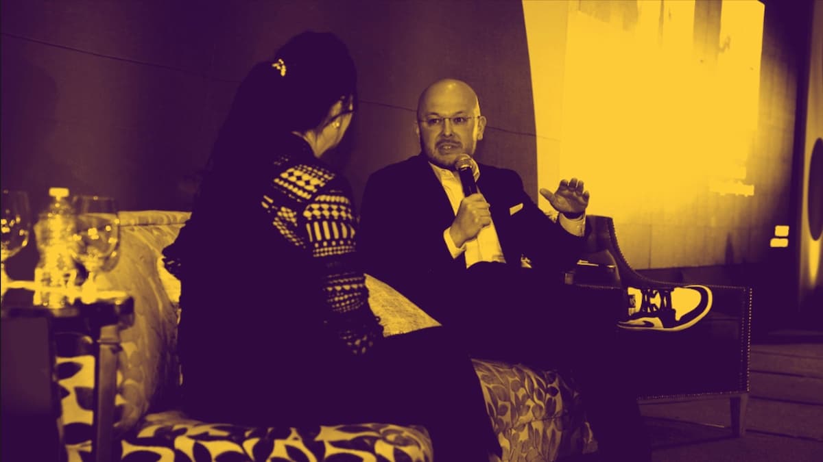 sepia image of a man and woman talking